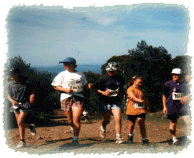 a family arrives at the top